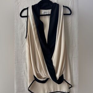 Elegant Black and Cream Sleeveless Blouse